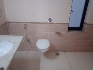 Bathroom in 4 BHK Apartment at Boat Club Road – for Sale