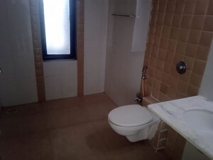 Bathroom in 4 BHK Apartment at Boat Club Road – for Sale