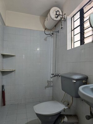 Bathroom in 1 BHK Apartment at Koregaon Park CHS, Koregaon Park – for Rent