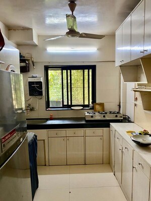 Kitchen in 2 BHK Apartment at Seven Bungalow, Andheri West – for Rent