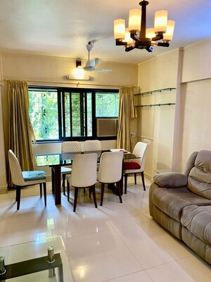 Living Room in 2 BHK Apartment at Seven Bungalow, Andheri West – for Rent