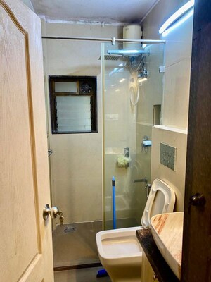 Bathroom in 2 BHK Apartment at Seven Bungalow, Andheri West – for Rent