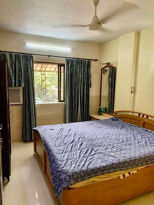 Bedroom in 2 BHK Apartment at Seven Bungalow, Andheri West – for Rent