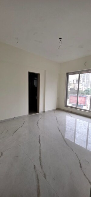 Room in 2 BHK Apartment at Oxford Navrang Navkar, Goregaon West – for Sale
