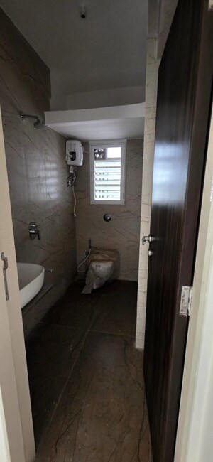 Bathroom in 2 BHK Apartment at Oxford Navrang Navkar, Goregaon West – for Sale