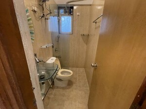 Bathroom in 3 BHK Apartment at Thakur Kedarnath Tower, Versova – for Rent