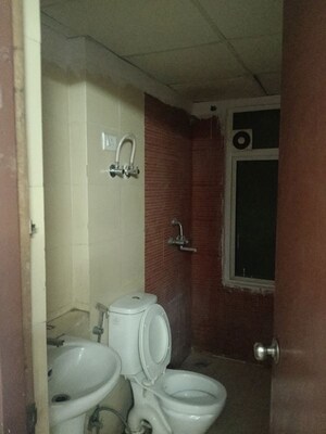 Bathroom in 2.5 BHK Apartment at Mahagun My Woods, Sector 16c Greater Noida – for Rent