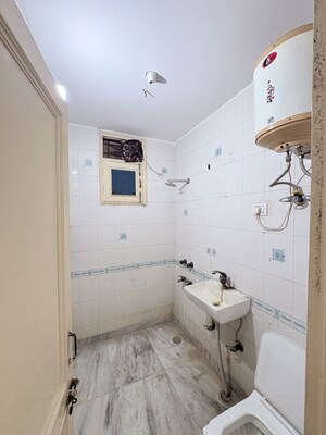 Bathroom in 2 BHK Builder Floor at Khirki Extension – for Rent