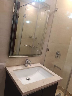 Bathroom in 4 BHK Builder Floor at Green Park – for Rent
