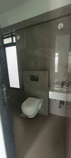 Bathroom in 1 BHK Apartment at RIPL Aikya Roots, Vikhroli West – for Rent