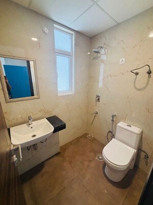 Bathroom in 2.5 BHK Builder Floor at M3M Soulitude, Sector 89 – for Rent