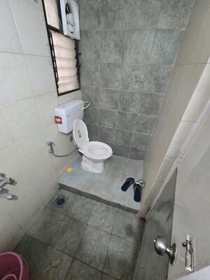 Bathroom in 2 BHK Apartment at Mittal Brothers Whistling Palms, Wakad – for Rent