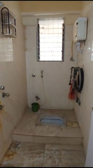Bathroom in 2 BHK Apartment at Lok Upvan I, Manpada – for Rent