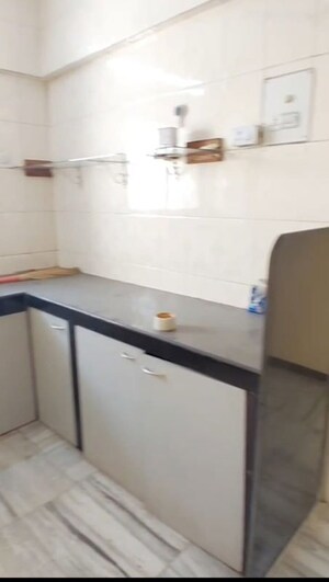 Kitchen in 2 BHK Apartment at Lok Upvan I, Manpada – for Rent