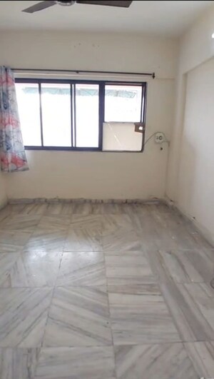 Bedroom in 2 BHK Apartment at Lok Upvan I, Manpada – for Rent