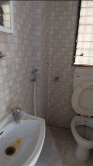 Bathroom in 2 BHK Apartment at Lok Upvan I, Manpada – for Rent