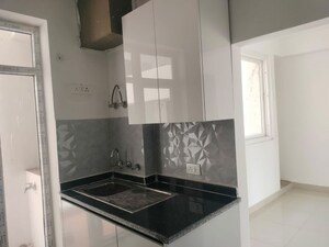 Kitchen in 4 BHK Apartment at AVS Orchard, Sector 77 – for Rent
