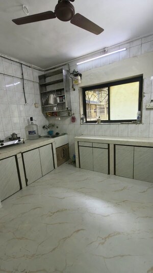 Kitchen in 1.5 BHK Apartment at Satya Apartment Naupada, Naupada – for Rent