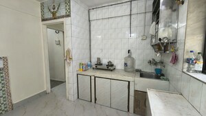 Kitchen in 1.5 BHK Apartment at Satya Apartment Naupada, Naupada – for Rent