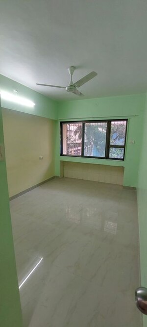 Room in 2 BHK Apartment at Manisha Purti CHS, Goregaon West – for Rent