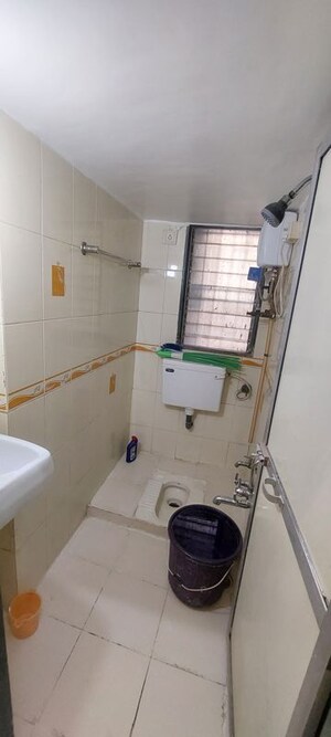 Team Area in 2 BHK Apartment at Manisha Purti CHS, Goregaon West – for Rent
