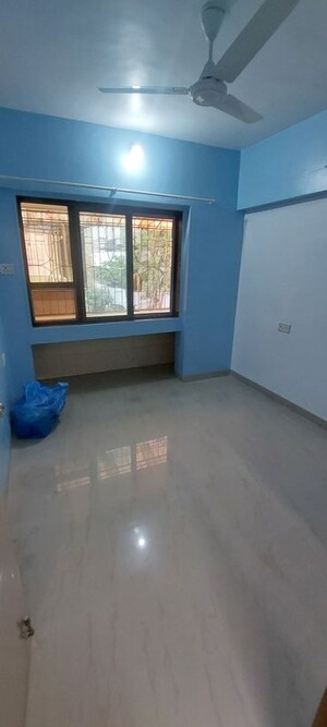 Room in 2 BHK Apartment at Manisha Purti CHS, Goregaon West – for Rent
