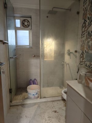 Bathroom in 4 BHK Apartment at Vasant Kunj – for Rent