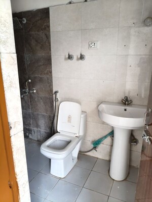 Bathroom in 2 BHK Apartment at JKG Palm Resort, Raj Nagar Extension – for Sale