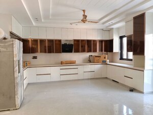 Kitchen in 4 BHK Builder Floor at Puri Aman Vilas, Sector 89 – for Sale