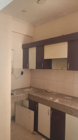 Kitchen in 2 BHK Apartment at Mahagun My Woods, Sector 16c Greater Noida – for Rent
