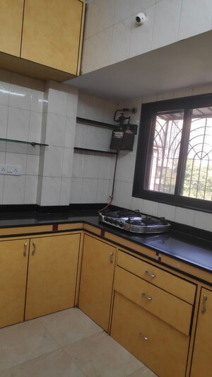 Kitchen in 1 BHK Apartment at Hiranandani Garden Eden III, Powai – for Rent