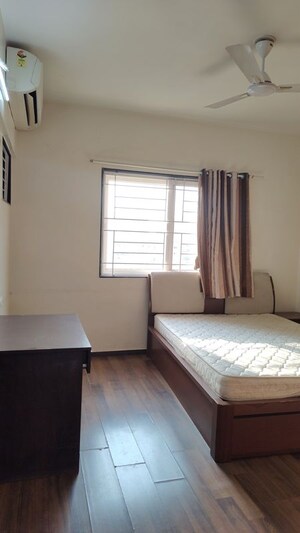 Bedroom in 2 BHK Apartment at Magarpatta City Roystonea, Hadapsar – for Rent