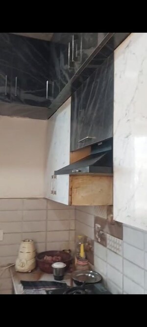 Kitchen in 4 BHK Apartment at Gaur Atulyam, Omicron I Greater Noida – for Rent