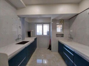 Kitchen in 3 BHK Apartment at Varun Garden, Ghodbunder Road – for Rent