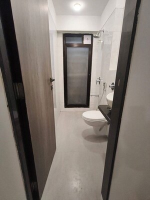 Bathroom in 2 BHK Apartment at Happy Jade Regency, Matunga – for Rent