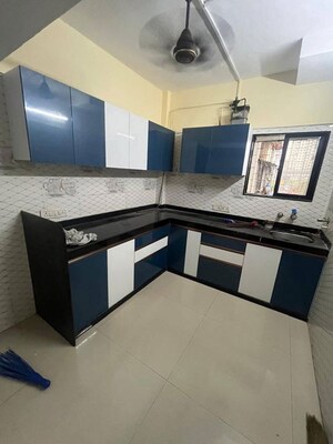 Kitchen in 2 BHK Apartment at Andheri CHS, Andheri West – for Rent