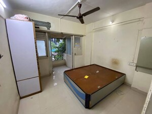 Bedroom in 2 BHK Apartment at Andheri CHS, Andheri West – for Rent