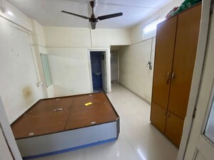 Bedroom in 2 BHK Apartment at Andheri CHS, Andheri West – for Rent