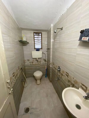 Bathroom in 2 BHK Apartment at Andheri CHS, Andheri West – for Rent