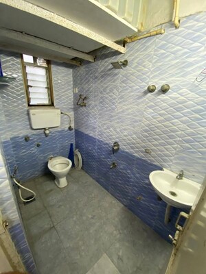 Bathroom in 2 BHK Apartment at Andheri CHS, Andheri West – for Rent