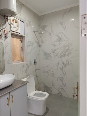 Bathroom in 3 BHK Builder Floor at Freedom Fighters Enclave – for Rent