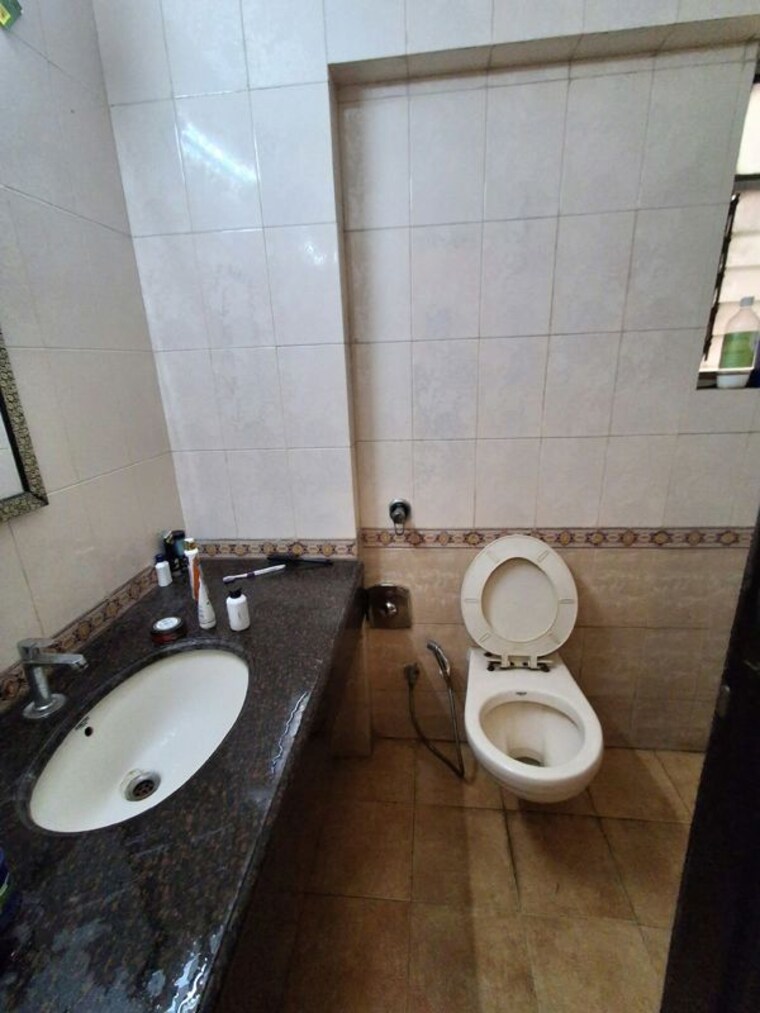 Bathroom, ajmera-bhakti-park 2 Bedroom 758 Sq.Ft. Apartment In Bhakti Park Mumbai 10789646