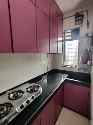 Kitchen in 1 BHK Apartment at Jalmeena CHS, Vile Parle East – for Rent