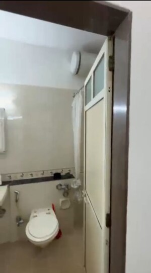 Bathroom in 1 BHK Apartment at K Raheja Heights, Malad East – for Rent
