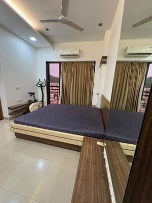 Bedroom in 2 BHK Apartment at K Raheja Heights, Malad East – for Rent