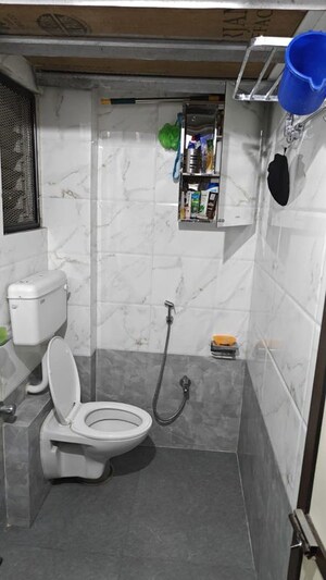 Bathroom in 2 BHK Apartment at Sadguru Garden CHS, Ghodbunder Road – for Rent