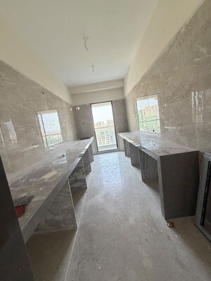 Kitchen in 4 BHK Apartment at Vivekanand Nagar – for Sale