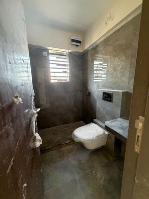 Bathroom in 4 BHK Apartment at Vivekanand Nagar – for Sale