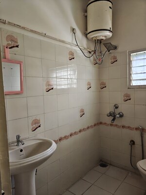 Bathroom in  Office Space at New Baiyyappanahalli Extension – for Rent