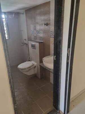 Bathroom in 2 BHK Apartment at Raunak Unnathi Woods Phase 4 And 5, Ghodbunder Road – for Sale